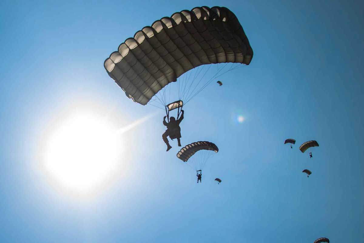 airborne special forces parachuting in formation